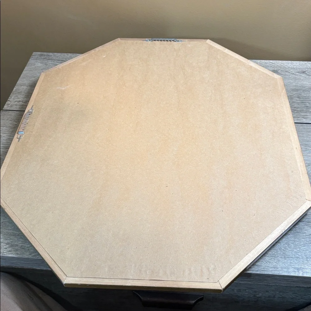 A mid century modern style octagonal mirror vertical or horizontal orientation